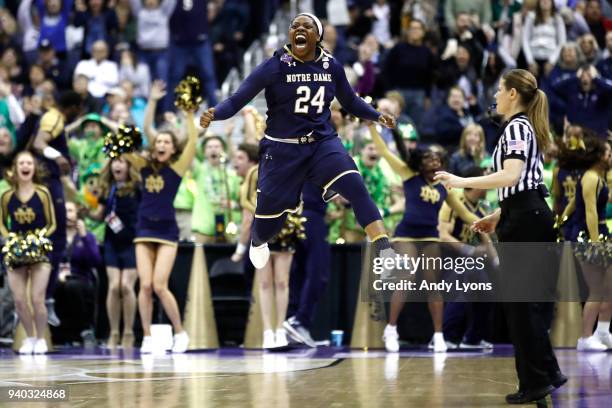 Arike Ogunbowale of the Notre Dame Fighting Irish celebrates her basket during overtime against the Connecticut Huskies in the semifinals of the 2018...