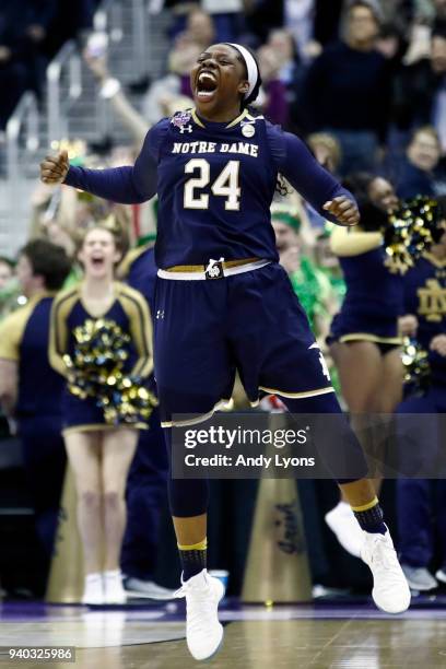 Arike Ogunbowale of the Notre Dame Fighting Irish celebrates her game winning basket with one second left in overtime against the Connecticut Huskies...