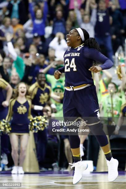 Arike Ogunbowale of the Notre Dame Fighting Irish celebrates her game winning basket with one second left in overtime against the Connecticut Huskies...