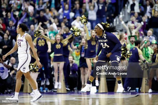 Arike Ogunbowale of the Notre Dame Fighting Irish celebrates her game winning basket with one second left in overtime against the Connecticut Huskies...