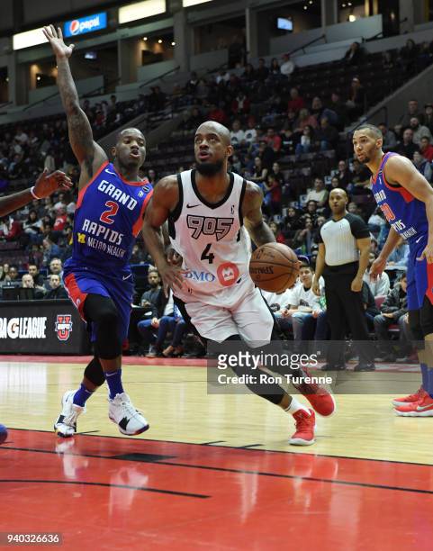 Lorenzo Brown of the Raptors 905 handles the ball against Kay Felder of the Grand Rapids Drive during Round One of the NBA G-League playoffs on March...