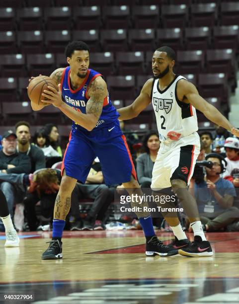 McDaniels of the Grand Rapids Drive handles the ball against Aaron Best of the Raptors 905 during Round One of the NBA G-League playoffs on March 30,...