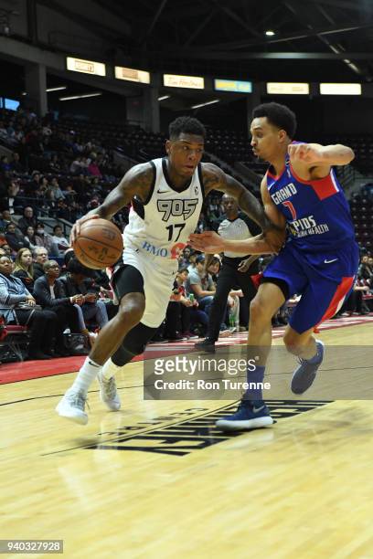 Fuquan Edwin of the Raptors 905 handles the ball against Reggie Hearn of the Grand Rapids Drive during Round One of the NBA G-League playoffs on...