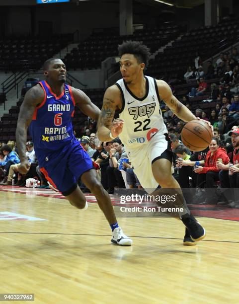 Malachi Richardson of the Raptors 905 handles the ball against Marcus Simmons of the Grand Rapids Drive during Round One of the NBA G-League playoffs...