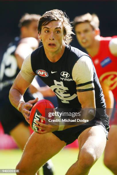 Caleb Marchbank of the Blues \ during the looks upfield round two AFL match between the Carlton Blues and the Gold Coast Suns at Etihad Stadium on...