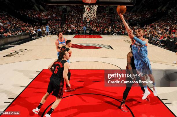 Sam Dekker of the LA Clippers shoots the ball against the Portland Trail Blazers on March 30, 2018 at the Moda Center Arena in Portland, Oregon. NOTE...