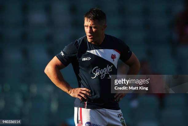 Cooper Cronk of the Roosters warms up before the round four NRL match between the Sydney Roosters and the New Zealand Warriors at Allianz Stadium on...
