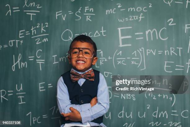 young math nerd boy in classroom - einstein stock pictures, royalty-free photos & images