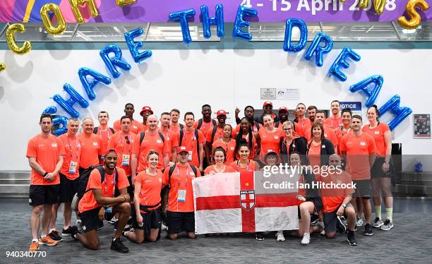 Members of the England mens and womens basketball team pose for a photo after arriving at the Townsville airport in Townsville ahead of the 2018 Gold...