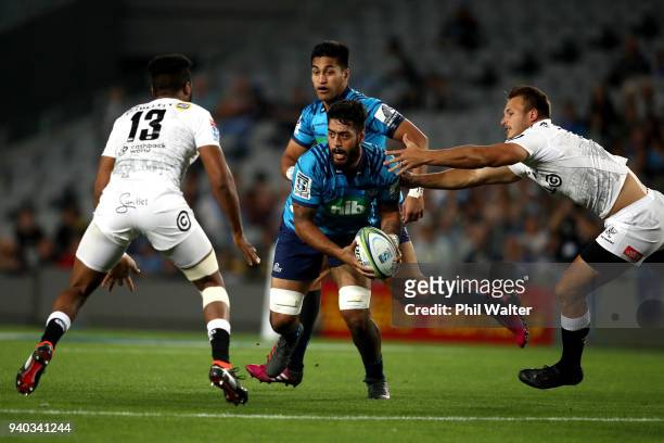 Akira Ioane of the Blues is tackld during the round sevens Super Rugby match between the Blues and the Sharks at Eden park on March 31, 2018 in...