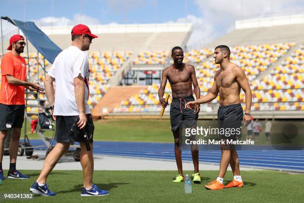 Adam Gemili talks with coaching staff during a Team England media opportunity ahead of the 2018 Gold Coast Commonwealth Games, at Queensland Sport...