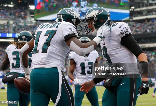 Nick Foles and Alshon Jeffery of the Philadelphia Eagles in action against the New York Giants on December 17, 2017 at MetLife Stadium in East...