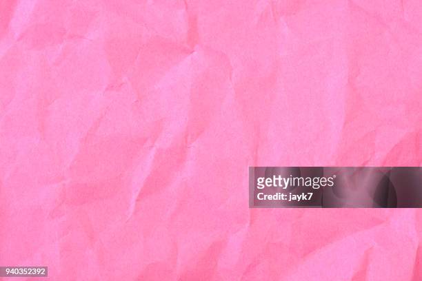crumpled paper - pink background stock pictures, royalty-free photos & images