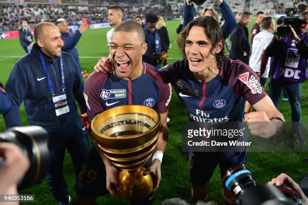 Kylian Mbappe of PSG and Edinson Cavani of PSG celebrate winning the Final of the French League Cup between Paris Saint Germain and AS Monaco on...