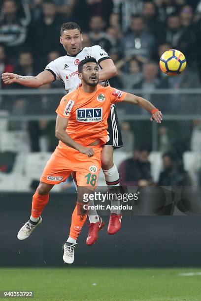 Dusko Tosic of Besiktas in action against Lucaz Villafanez of Aytemiz Alanyaspor during a Turkish Super Lig week 27 soccer match between Besiktas and...