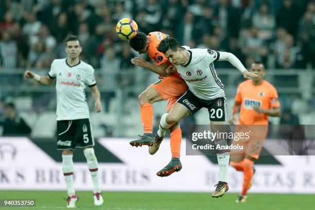 Necip Uysal of Besiktas in action against Baris Basdas of Aytemiz Alanyaspor during a Turkish Super Lig week 27 soccer match between Besiktas and...