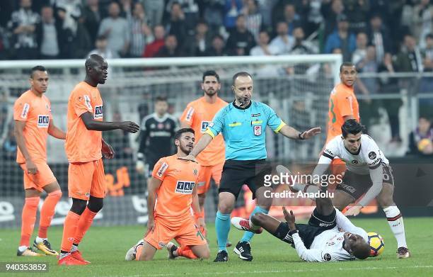 Atiba Hutchinson of Besiktas argues with Lucas Villafanez of Aytemiz Alanyaspor during a Turkish Super Lig week 27 soccer match between Besiktas and...