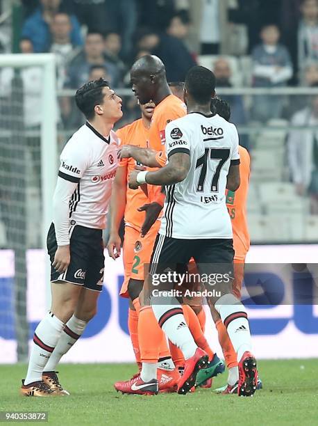 Necip Uysal of Besiktas argues with Isaac Sackey of Aytemiz Alanyaspor during a Turkish Super Lig week 27 soccer match between Besiktas and Aytemiz...