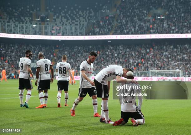 Anderson Talisca of Besiktas celebrates with his teammates after scoring during a Turkish Super Lig week 27 soccer match between Besiktas and Aytemiz...