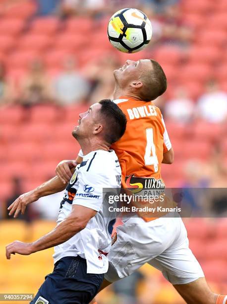 Daniel Bowles of the Roar competes for the ball during the round 25 A-League match between the Brisbane Roar and the Central Coast Mariners at...