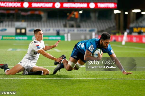 Akira Ioane of the Blues scores a try during the round sevens Super Rugby match between the Blues and the Sharks at Eden park on March 31, 2018 in...