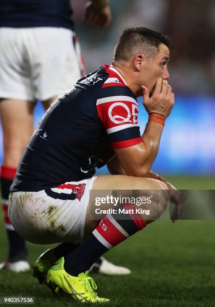 Cooper Cronk of the Roosters looks dejected during the round four NRL match between the Sydney Roosters and the New Zealand Warriors at Allianz...