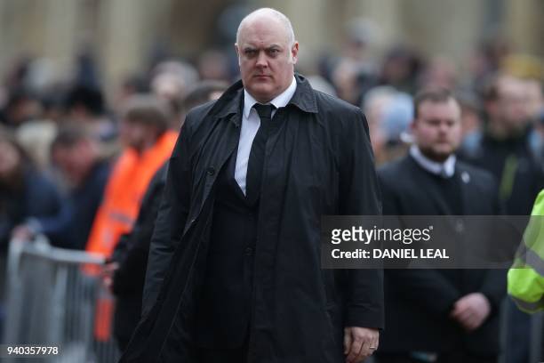 Irish comedian Dara O'Briain arrives to attend the funeral of British scientist Stephen Hawking at the Church of St Mary the Great, in Cambridge on...
