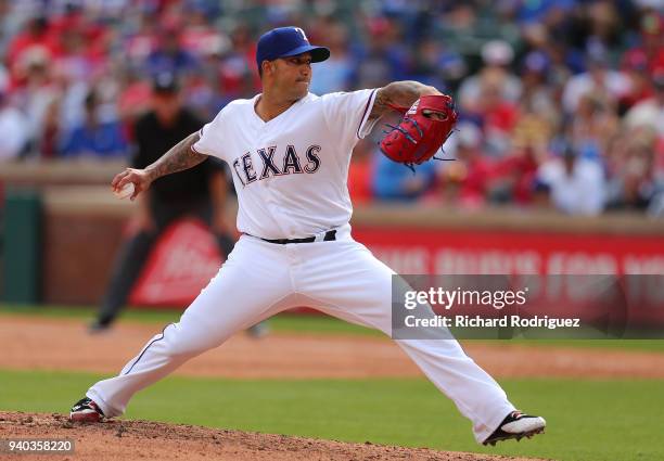 Matt Bush of the Texas Rangers pitches in the eighth inning against the Houston Astros on Opening Day at Globe Life Park in Arlington on March 29,...