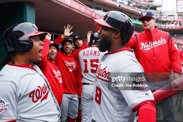 Brian Goodwin of the Washington Nationals celebrates with Wilmer Difo after hitting a grand slam home run in the ninth inning of the game against the...