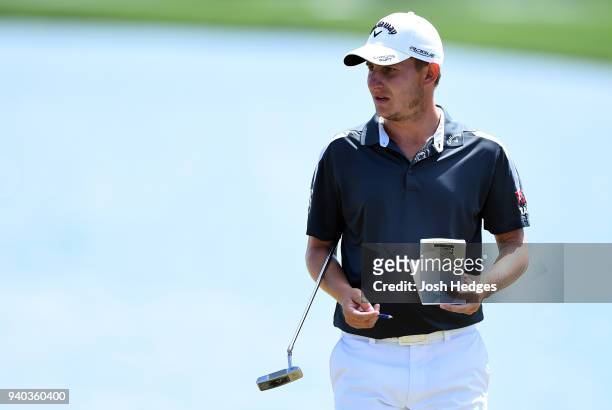 Emiliano Grillo of Argentina prepares to putt on the 18th green during the third round of the Houston Open at the Golf Club of Houston on March 31,...
