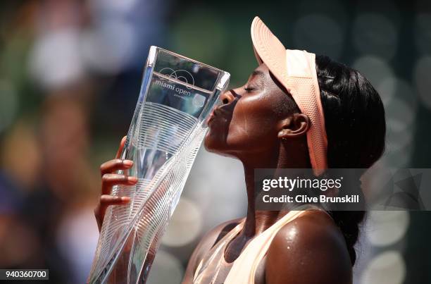 Sloane Stephens of the United States kisses the Miami Open trophy after her straight sets victory against Jelena Ostapenko of Latvia in the women's...