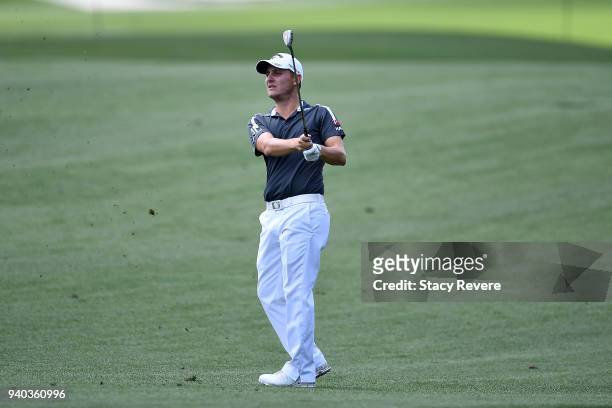 Emiliano Grillo of Argentina hits his approach shot on the 15th hole during the third round of the Houston Open at the Golf Club of Houston on March...