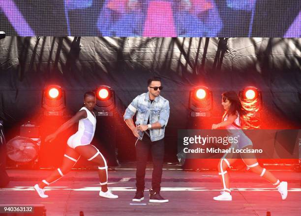 Luis Fonsi performs onstage during Coca-Cola Music at the NCAA March Madness Music Festival at Hemisfair on March 31, 2018 in San Antonio, Texas.