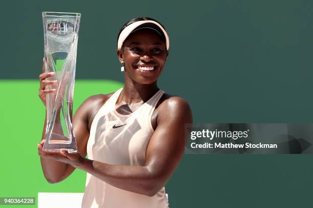 Sloane Stephens poses with the Butch Buchholz trophy after her win over Jelena Ostapenko of Latvia during the women's final of the Miami Open...