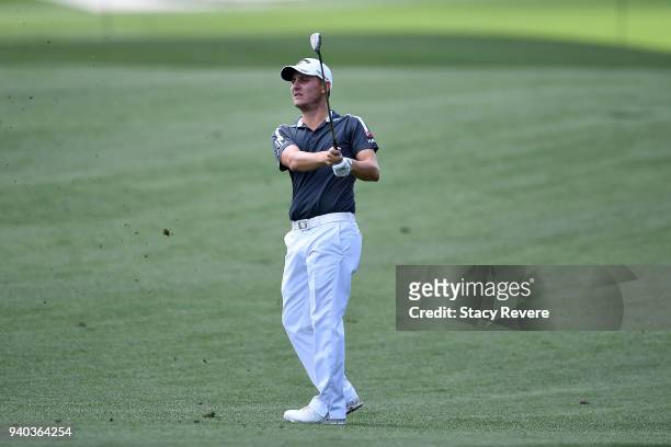Emiliano Grillo of Argentina hits his approach shot on the 15th hole during the third round of the Houston Open at the Golf Club of Houston on March...