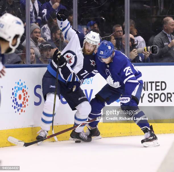 March 31 In the first period, Winnipeg Jets defenseman Joe Morrow and Toronto Maple Leafs center William Nylander battle for the puck The Toronto...