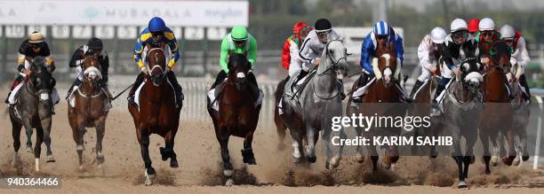 Jockey Roberto Perez rides Tallabb Al Khalediah before winning the Dubai Kahayla Classic horse race at the Dubai World Cup on March in the Meydan...