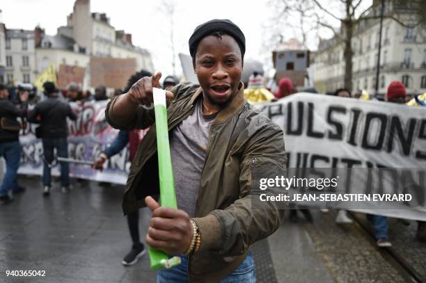 Members of associations, unions and collectives, supporting migrants but also occupants of the ZAD of Notre-Dame-des-Landes, demonstrate against...