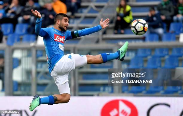Napoli's Italian striker Lorenzo Insigne controls the ball during the Italian Serie A football match Sassuolo vs Napoli at Mapei Stadium in Reggio...