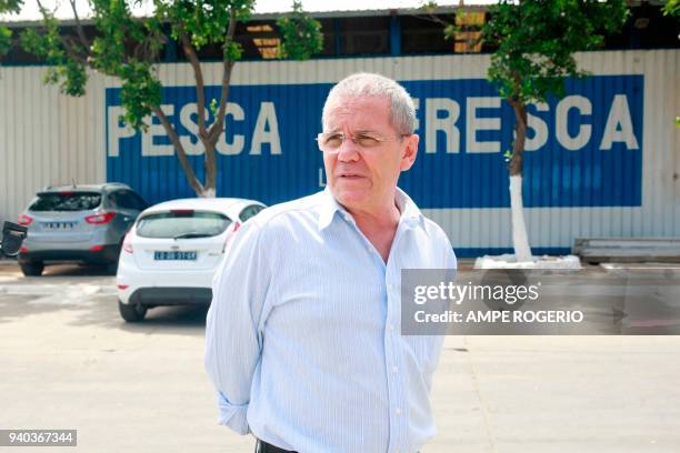 Managing director of the Fish factory "Pesca Fresca," Jose Neves looks on outside of the company compound on February 10, 2018 in the Angolan coastal...