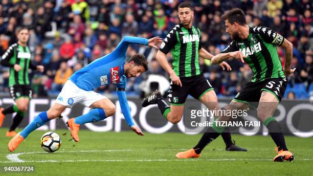 Napoli's Belgian striker Dries Mertens fights for the ball with Napoli's Brazilian midfielder Marques Loureiro Allan during the Italian Serie A...