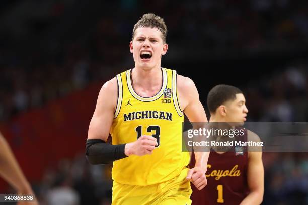 Moritz Wagner of the Michigan Wolverines celebrates after a play in the second half against the Loyola Ramblers during the 2018 NCAA Men's Final Four...