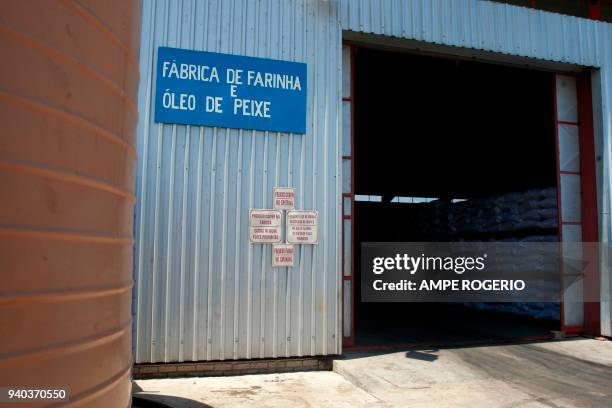 This photo taken on February 12, 2018 shows the entrance to the "Pesca Fresca" fish factory in the Angolan coastal city of Benguela. - Angolan...