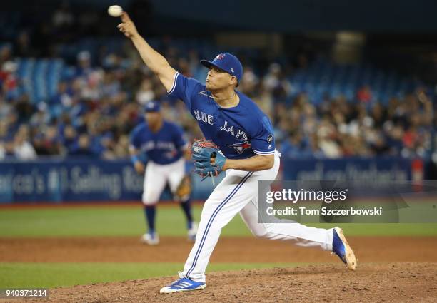 Roberto Osuna of the Toronto Blue Jays delivers a pitch in the ninth inning during MLB game action against the New York Yankees at Rogers Centre on...