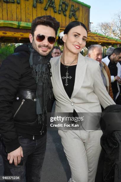 Singer Gregory Bakian and model/writer Sylvie Ortega Munos attend the Foire du Trone Opening At Pelouse de Reuilly on March 30, 2018 in Paris, France.