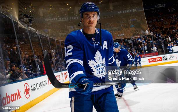 Tyler Bozak of the Toronto Maple Leafs skates during warmup before the Leafs face the Winnipeg Jets at the Air Canada Centre on March 31, 2018 in...