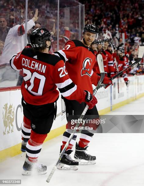 Blake Coleman of the New Jersey Devils celebrates his goal with teammate Michael Grabner of the New Jersey Devils in the second period against the...