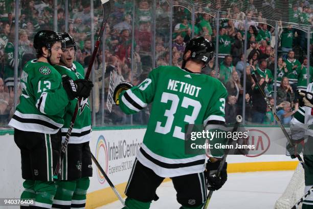 Jason Spezza, Mattias Janmark, Marc Methot and the Dallas Stars celebrate a goal against the Minnesota Wild at the American Airlines Center on March...