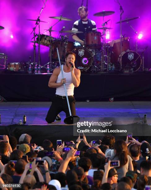 Singer Dan Reynolds and drummer Daniel Platzman perform onstage during Coca-Cola Music at the NCAA March Madness Music Festival at Hemisfair on March...