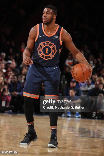 Emmanuel Mudiay of the New York Knicks handles the ball during the game against the Detroit Pistons on March 31, 2018 at Madison Square Garden in New...